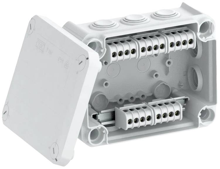 Boîte de connexion grise avec couvercle ouvert. À l'intérieur, plusieurs bornes pour les fils sont visibles.