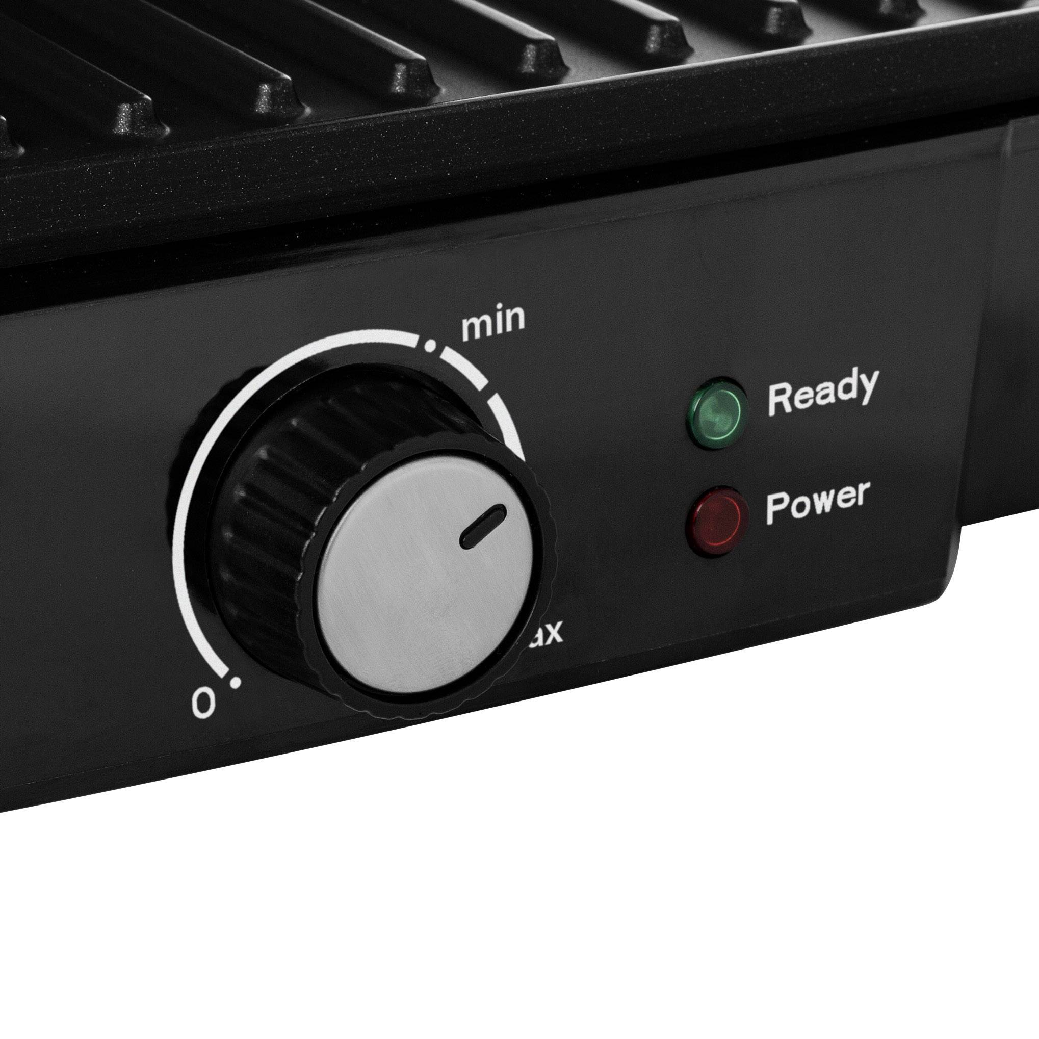 Gros plan d'un gril électrique avec régulateur de température et voyants de fonctionnement. Les textes 'Ready' et 'Power' indiquent le statut de fonctionnement.