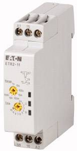Un relais temporel électronique EATON, modèle ETR2-11, doté de boutons rotatifs réglables pour le réglage du temps et de plusieurs bornes de connexion.