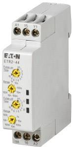 Un appareil électronique gris avec des boutons et des connexions, étiqueté 'EATON ETR2-44'. Utilisé pour le contrôle temporel ou la commutation.