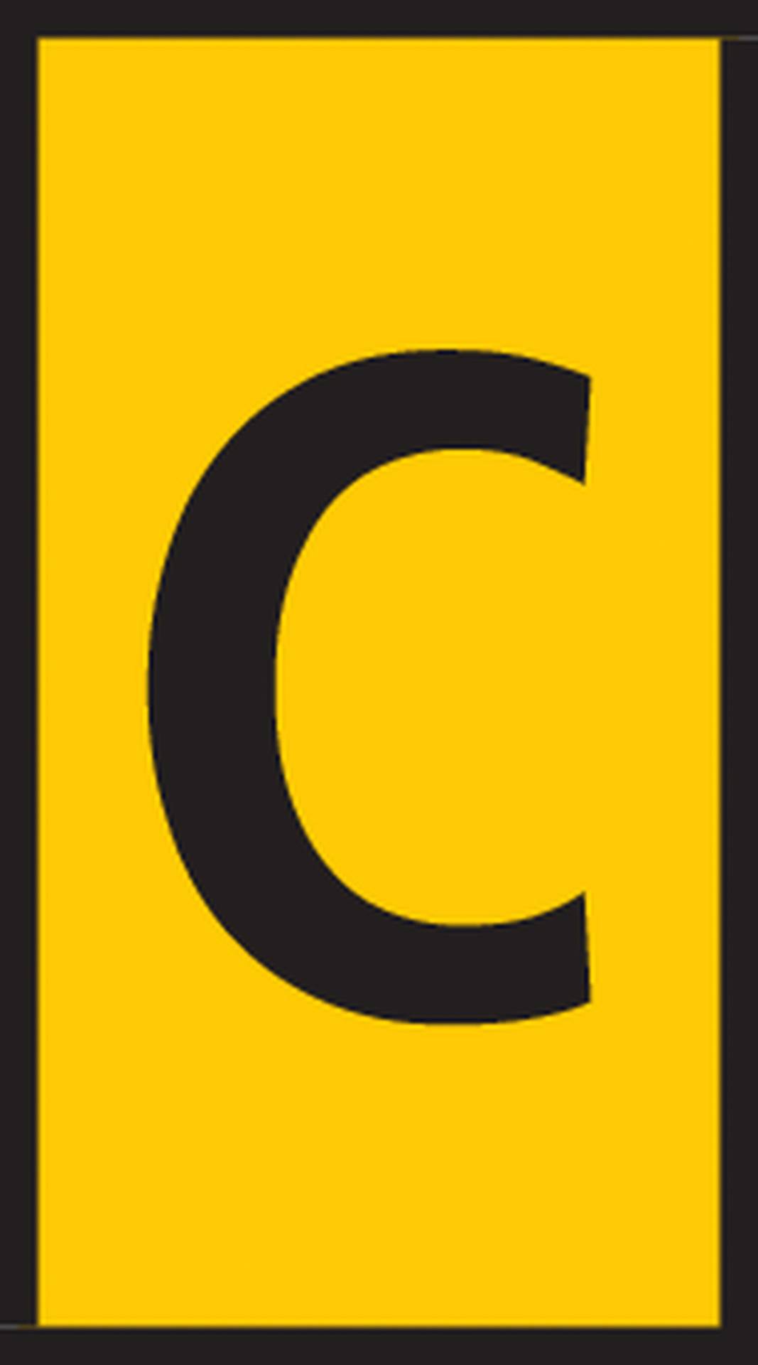 Panneau jaune avec un grand 'C' noir au centre.