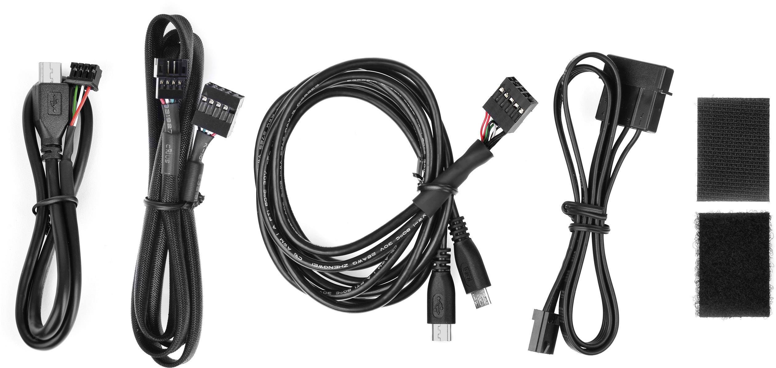 Quatre câbles différents et deux bandes auto-agrippantes alignés côte à côte. À gauche, un câble USB, à droite, un câble d'alimentation.