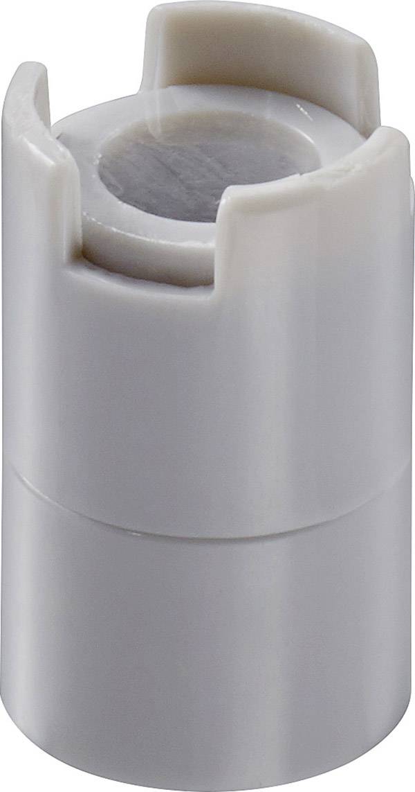 Une pièce cylindrique en plastique blanc, avec une ouverture en haut. Pourrait être utilisée comme bouchon ou comme pièce d'adaptation.