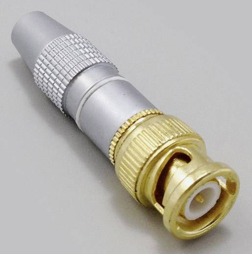 Connecteur coaxial à revêtement or et argent, utilisé pour la connexion des signaux vidéo et audio dans les appareils électroniques.