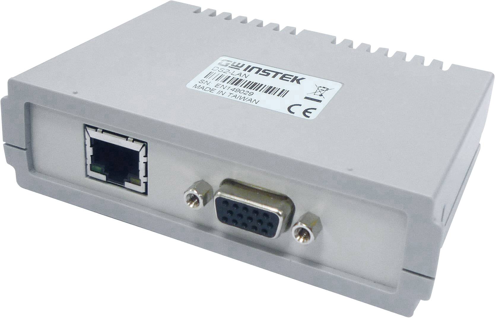 Un appareil électronique gris avec des ports RJ45 et VGA sur le devant. Fabriqué à Taïwan.