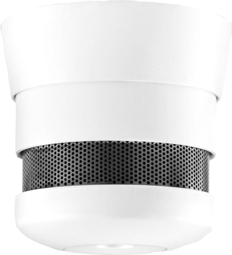 Un détecteur de fumée blanc avec une grille de ventilation noire, installé au plafond.