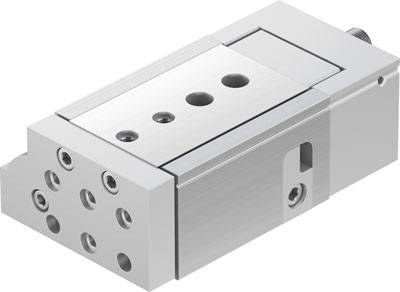 Un cylindre linéaire rectangulaire en métal avec plusieurs alésages circulaires, adapté aux applications mécaniques de précision.