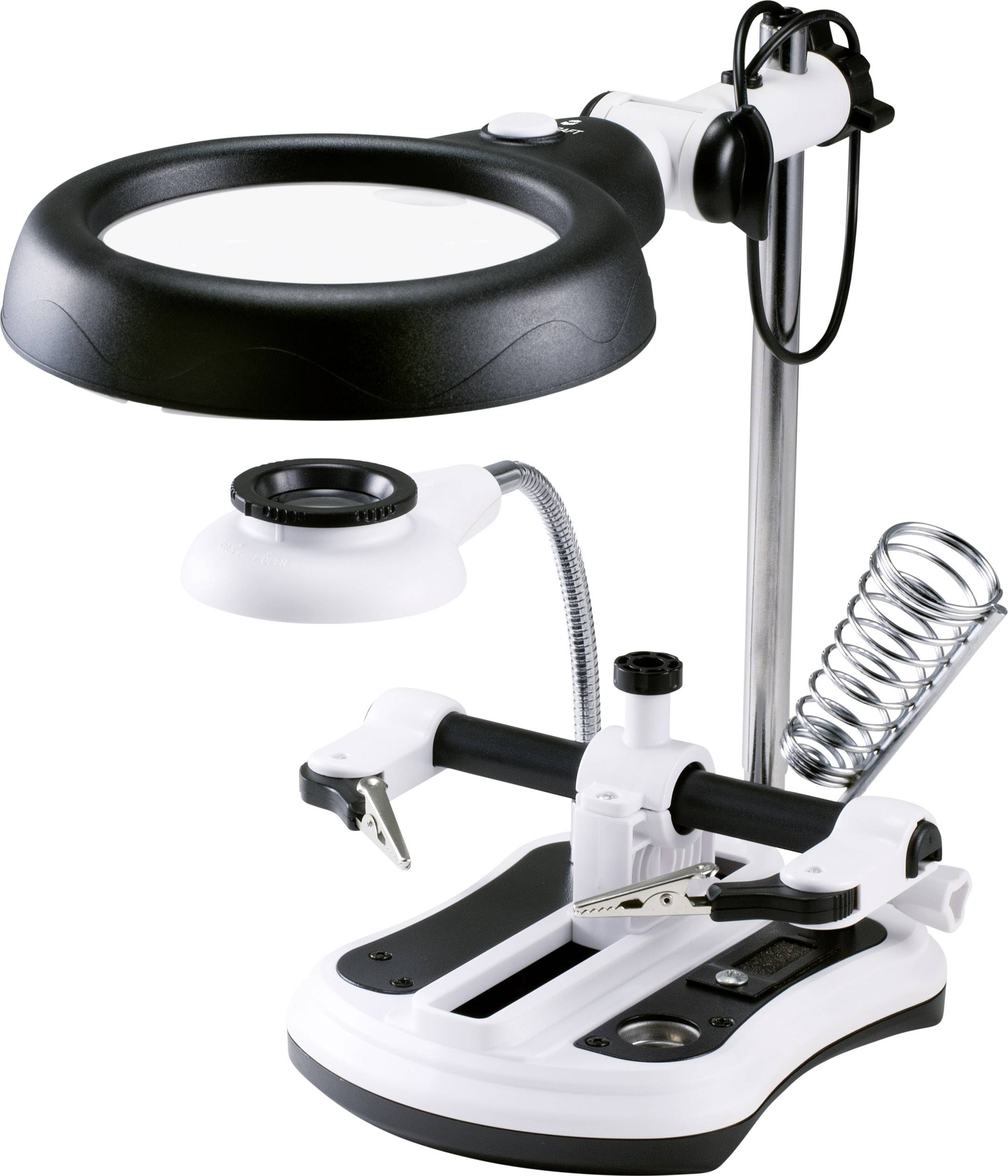 Lampe loupe avec supports et lentilles interchangeables pour des travaux de précision, éclairée par un éclairage LED intégré.