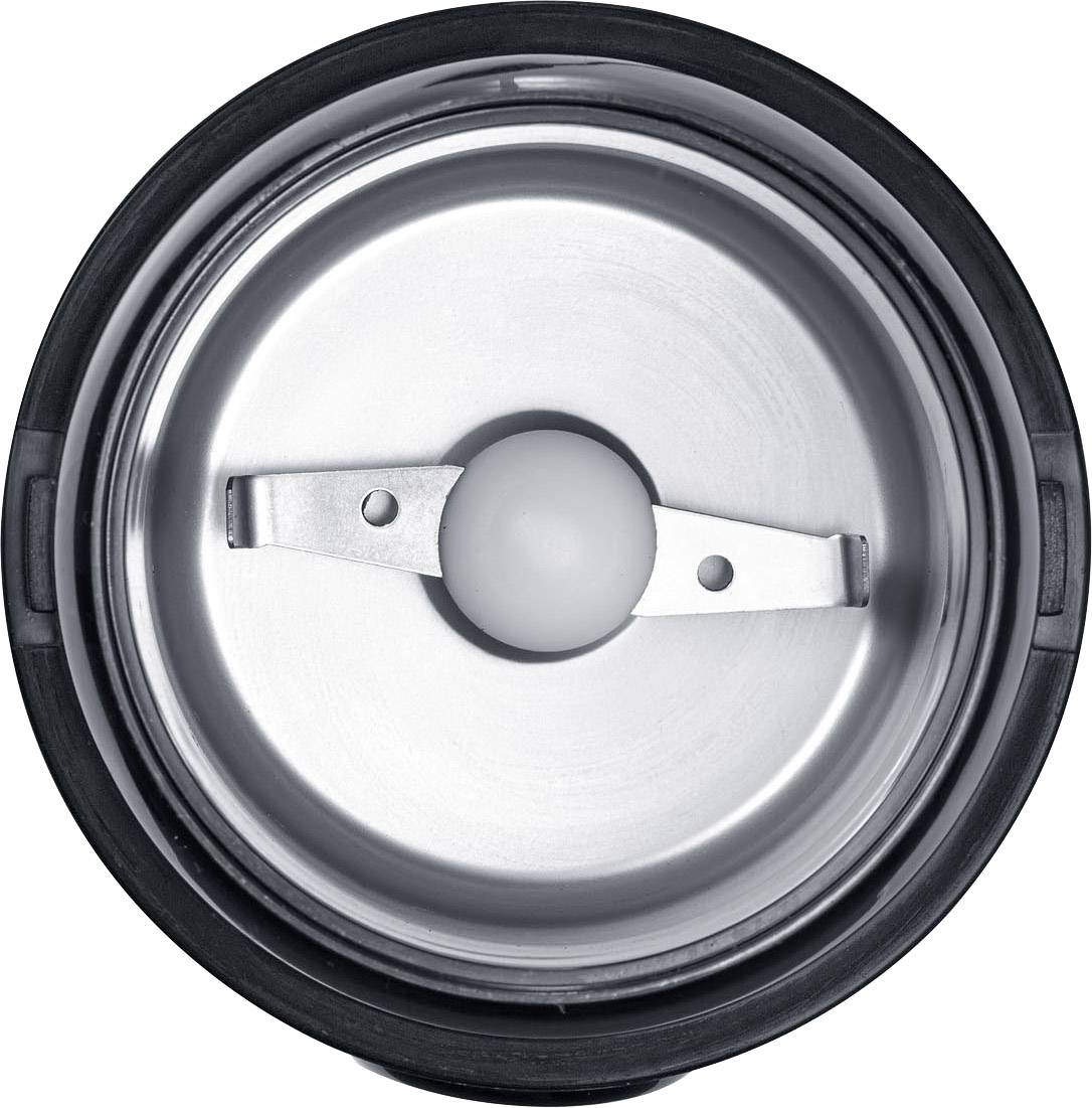 Disque métallique avec un élément central blanc et deux attaches métalliques latérales dans un cadre noir rond.