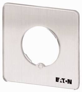 Plaque frontale carrée en métal avec découpe circulaire au centre, adaptée pour le montage d'interrupteurs. Nom de marque 'EATON' en bas à droite.