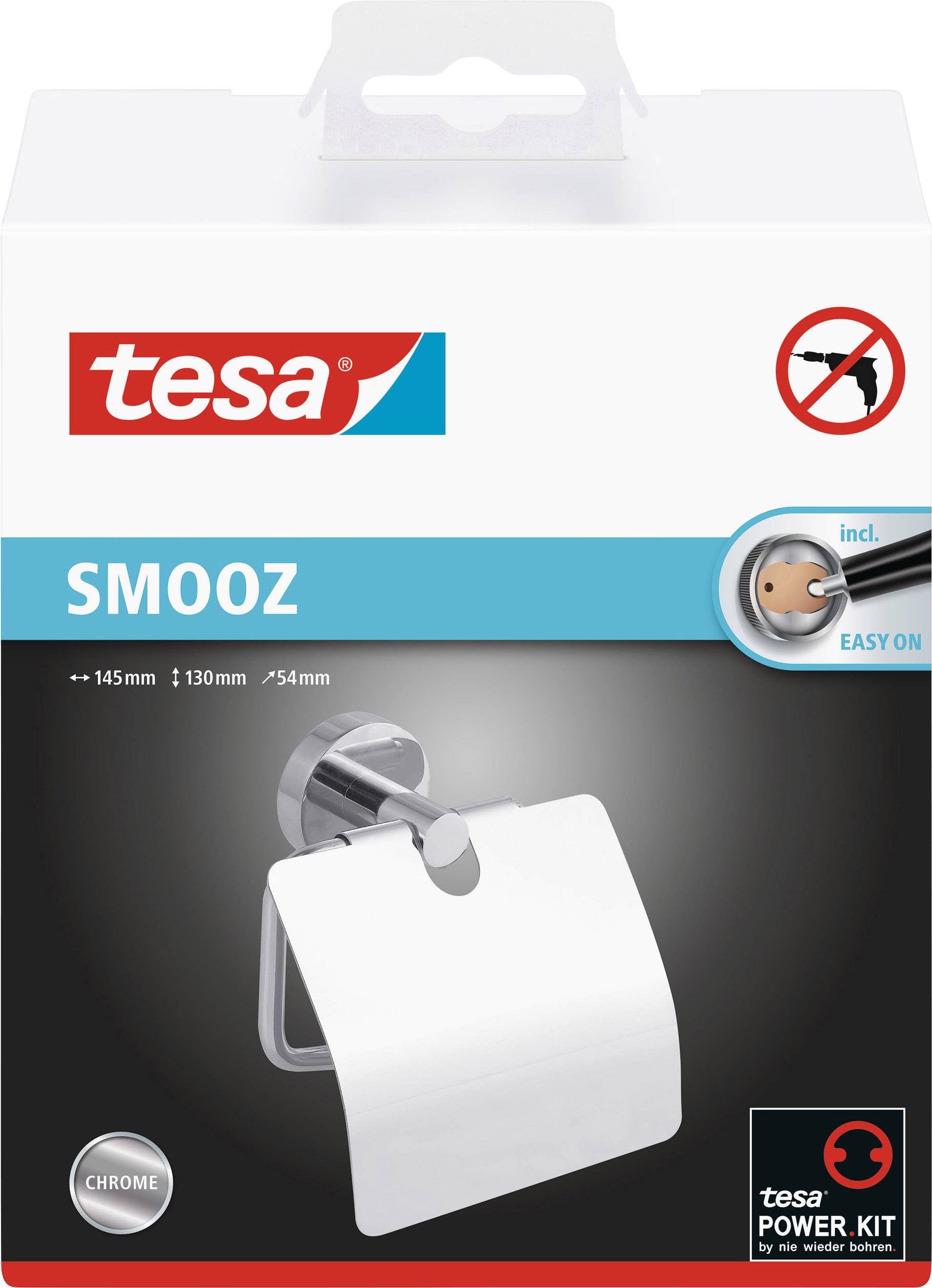 Emballage d'un support de papier toilette tesa SMOOZ avec illustration du produit. Comprend un kit de fixation facile, en finition chrome.