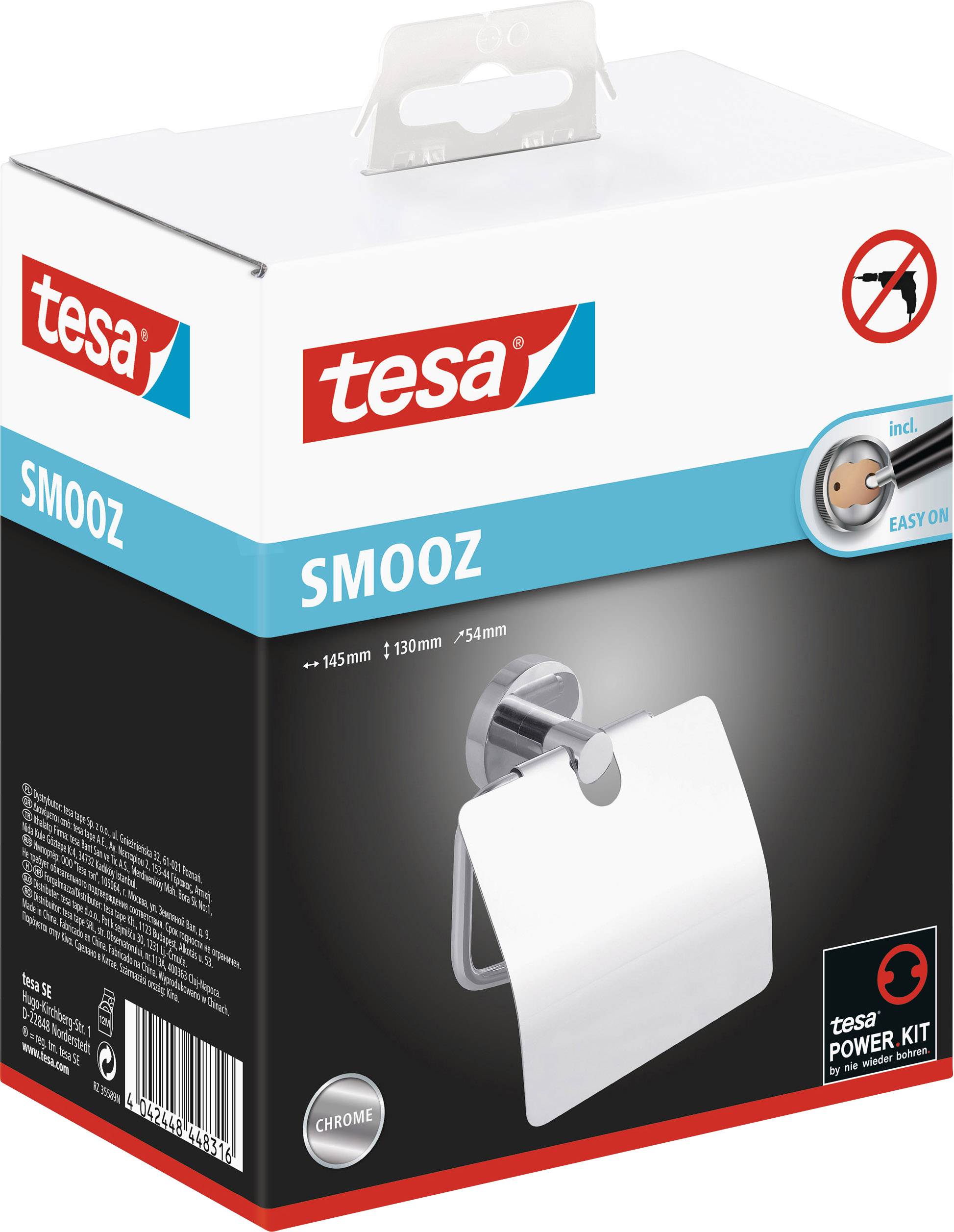 Emballage d'un support de papier toilette tesa SMOOZ. Le produit est en chrome, avec crochets Easy-On et kit de fixation Power.Kit pour une installation facile.