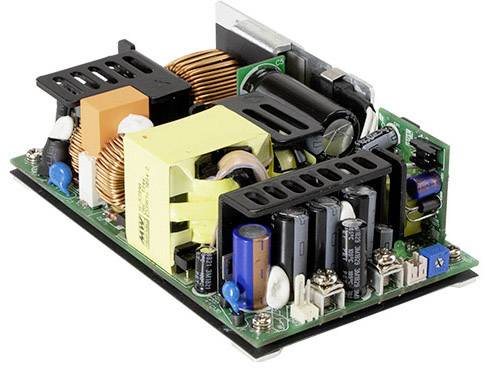 Une carte électronique ouverte présentant plusieurs composants électriques, dont des transformateurs, des bobines et des condensateurs.