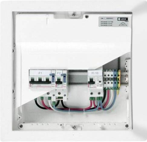 Un boîtier de fusibles ouvert avec quatre fusibles visibles (F1, F2, FI-10) et des connexions de câbles de différentes couleurs.