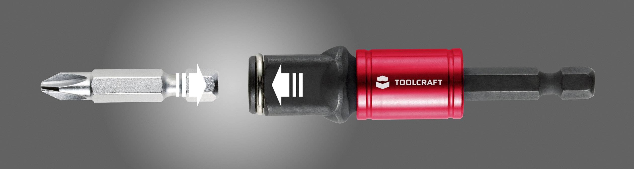 Tournevis à embouts avec support magnétique de bits en gros plan, avec embout interchangeable à gauche et poignée rouge et noire à droite.