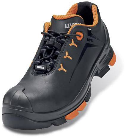 Chaussure de sécurité noire avec des touches orange et une semelle robuste. Nom de marque 'Uvex' visible à l'avant. Adaptée aux chantiers.