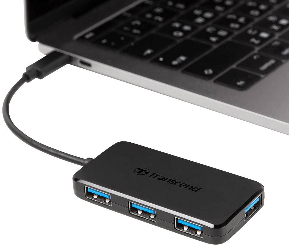 Un hub USB est connecté à un ordinateur portable. Le hub dispose de quatre ports USB et porte le logo 'Transcend'.