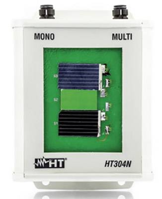 Un appareil électrique, marqué 'MONO', 'MULTI' et 'HT304N', présente des composants électroniques câblés sur un circuit imprimé vert.