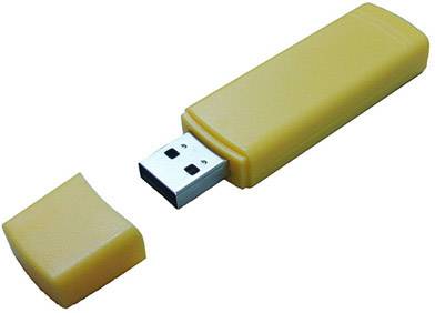Clé USB avec capuchon retiré, montrant le connecteur USB. Boîtier de couleur beige.
