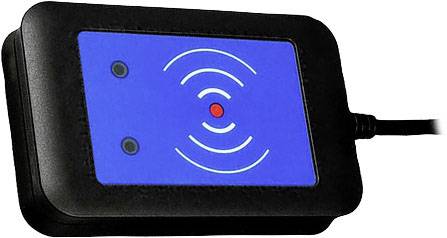 Un appareil noir avec un champ bleu au centre, montrant des cercles concentriques autour d'un point rouge. Un câble est connecté.