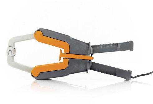 Un dispositif de serrage gris et orange, qui semble électrique, est posé sur une surface blanche.