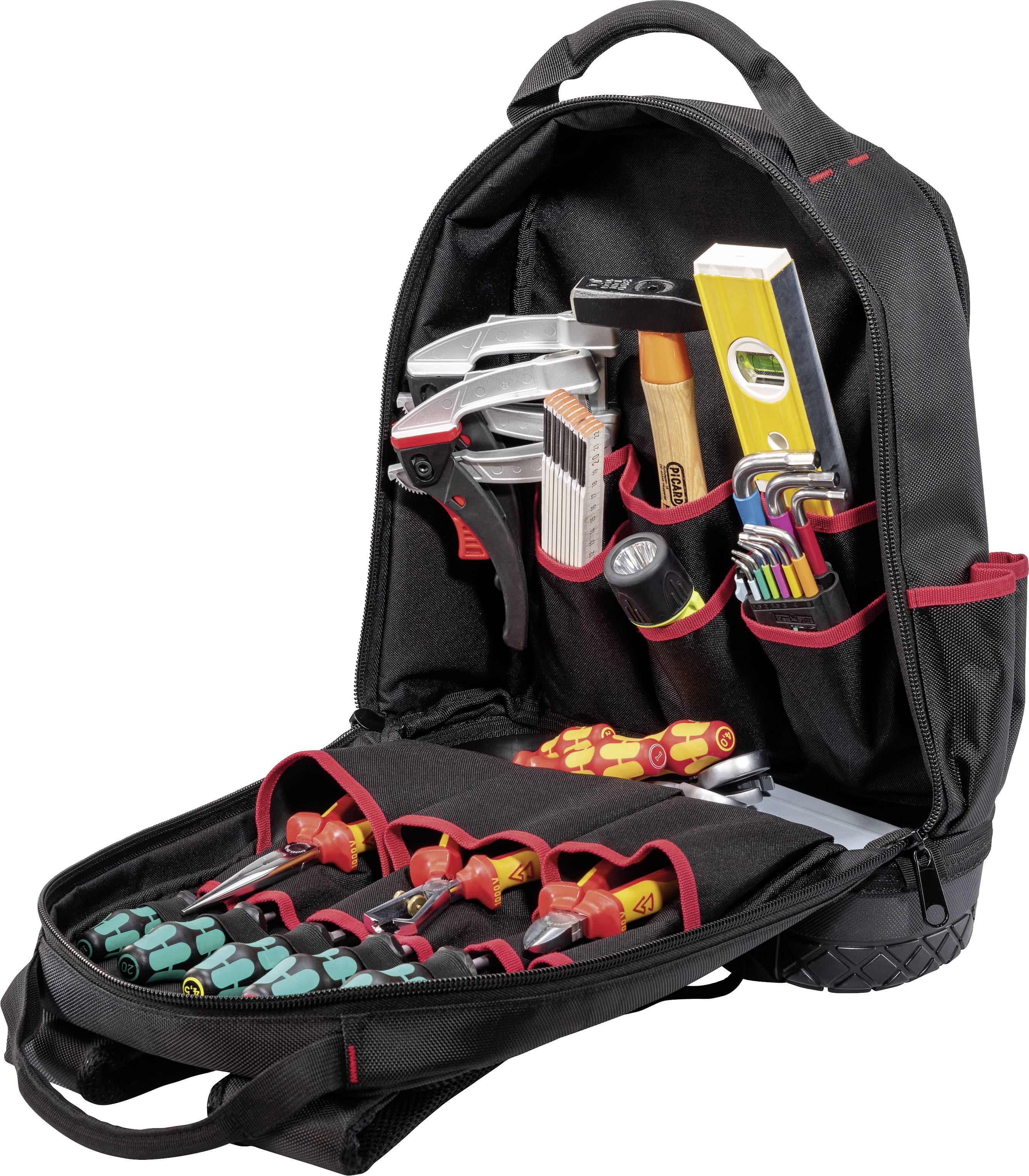 Un sac à dos à outils ouvert contenant divers outils manuels tels que tournevis, pinces, marteau et niveau à bulle, soigneusement rangés.