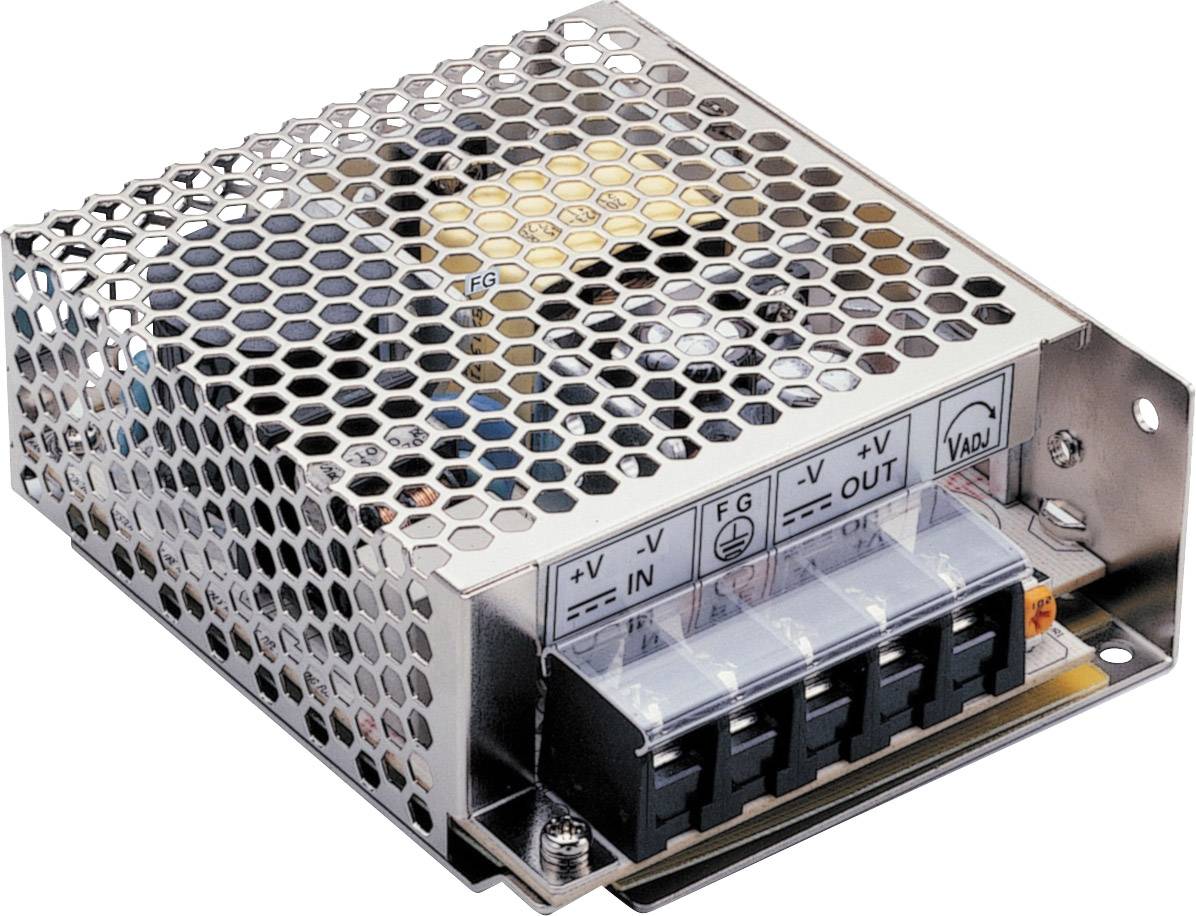 Un boîtier métallique avec des grilles de ventilation abrite une alimentation électrique. À l'avant, des bornes de connexion pour l'entrée et la sortie sont visibles.