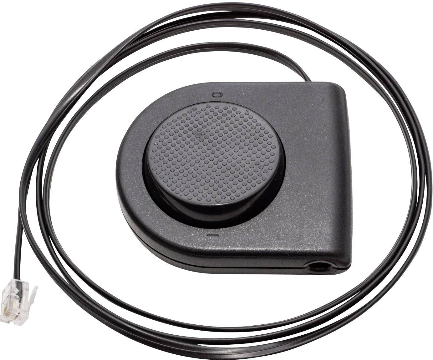 « Une pédale noire, circulaire, avec un long câble et une fiche RJ11 à son extrémité. »