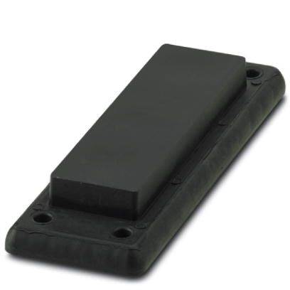 Un aimant rectangulaire, plat et noir sur une base noire, avec quatre trous de fixation aux angles.