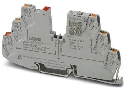 Un composant électronique, probablement un dispositif de protection contre les surtensions, avec des étiquettes et des connexions pour les entrées et les sorties.