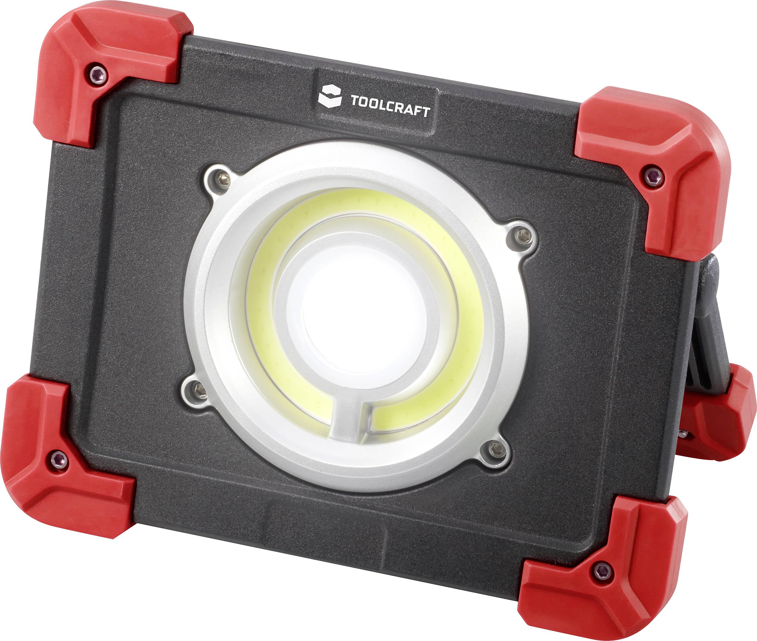 Projecteur LED TOOLCRAFT, noir avec coins rouges, luminaire central rond, adapté aux travaux de construction et de réparation.