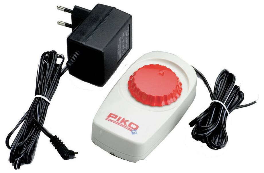 Alimentation et régulateur de Piko avec bouton rotatif rouge pour le contrôle de la vitesse des trains miniatures.