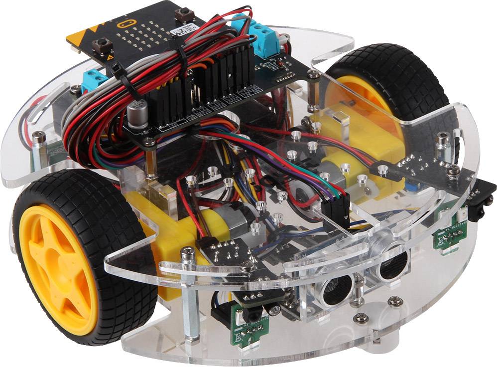 Un petit robot rond avec des roues jaunes et des composants électroniques visibles. Développé pour la programmation simple et les expériences de robotique.