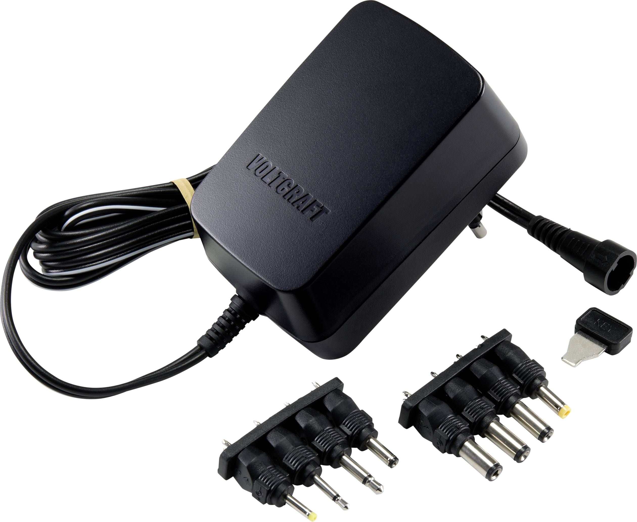 Bloc d'alimentation noir avec plusieurs fiches d'adaptation interchangeables, adapté à différents appareils électroniques.