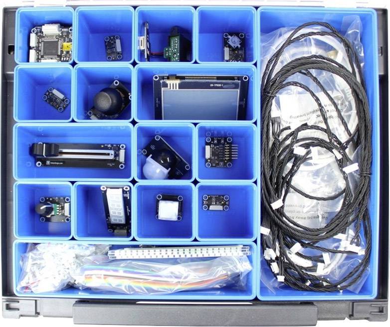 Un kit électronique avec différents modules, capteurs et câbles dans une mallette, adapté aux projets DIY et au prototypage.