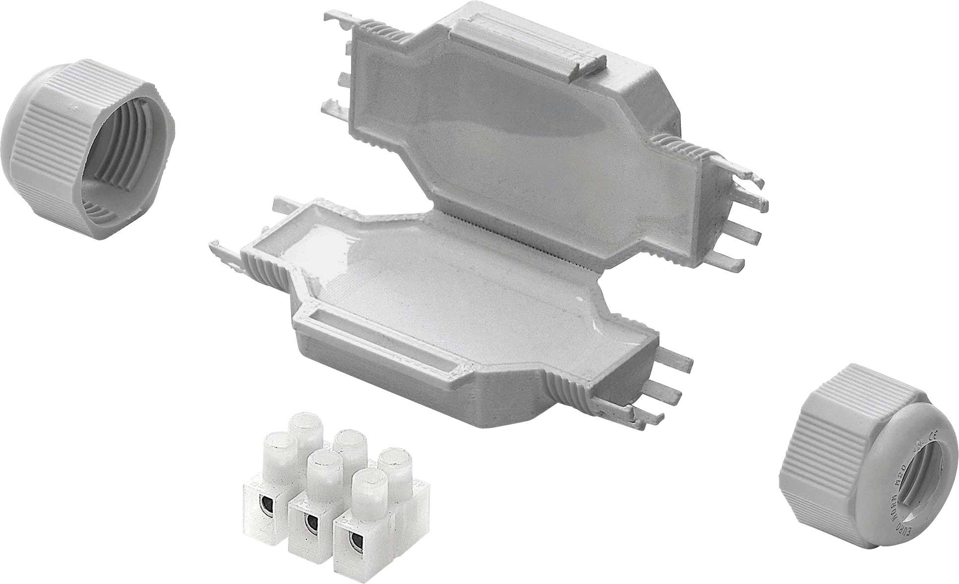 Un connecteur de câble gris, composé de deux moitiés, représenté avec une borne de raccordement et deux capuchons de vis.