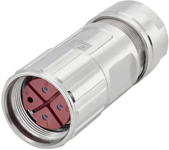 Un connecteur argenté avec un insert rouge montre quatre broches numérotées disposées en carré.