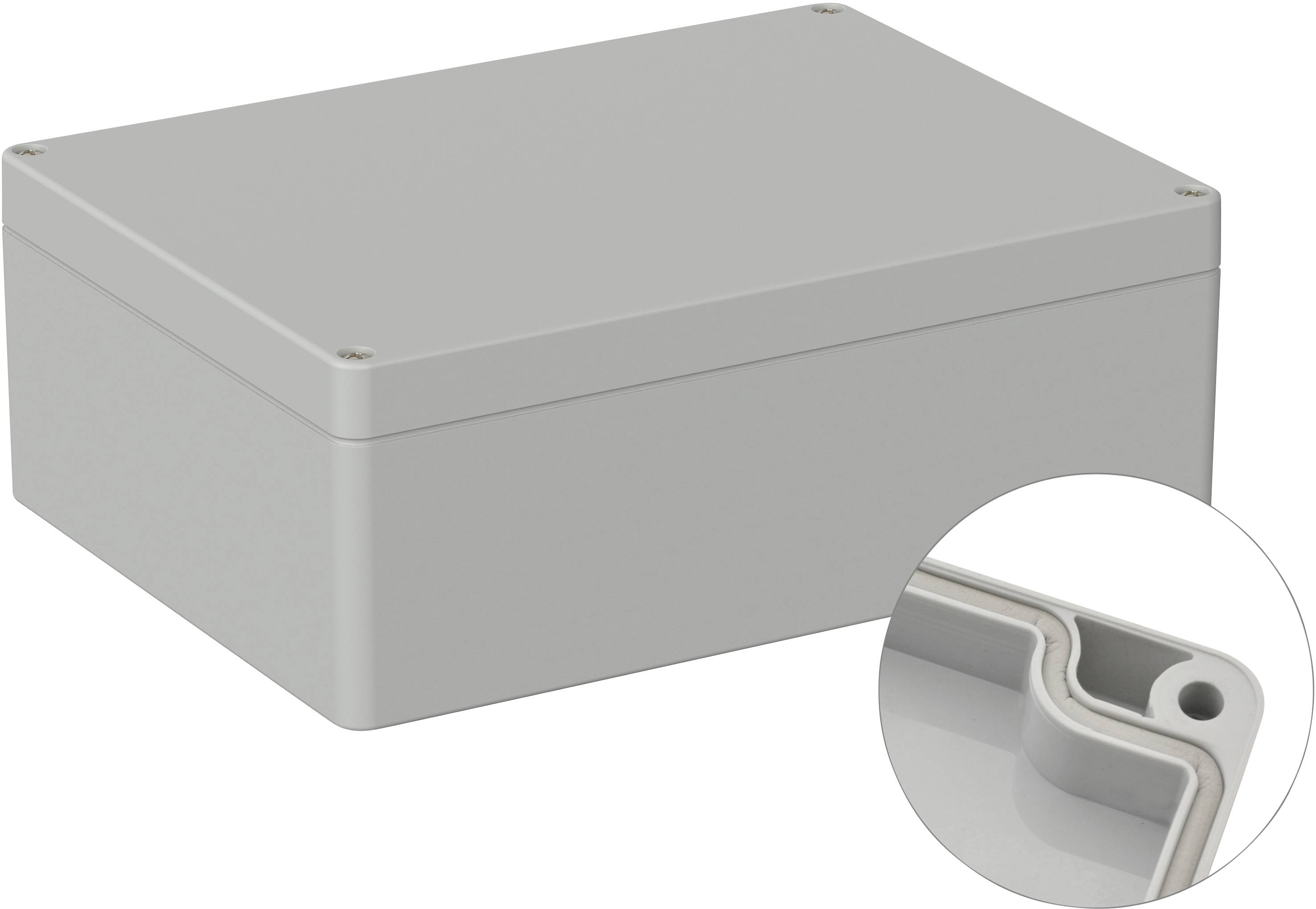Boîtier rectangulaire gris avec couvercle amovible, quatre vis aux angles. Gros plan sur le profil de bordure robuste.