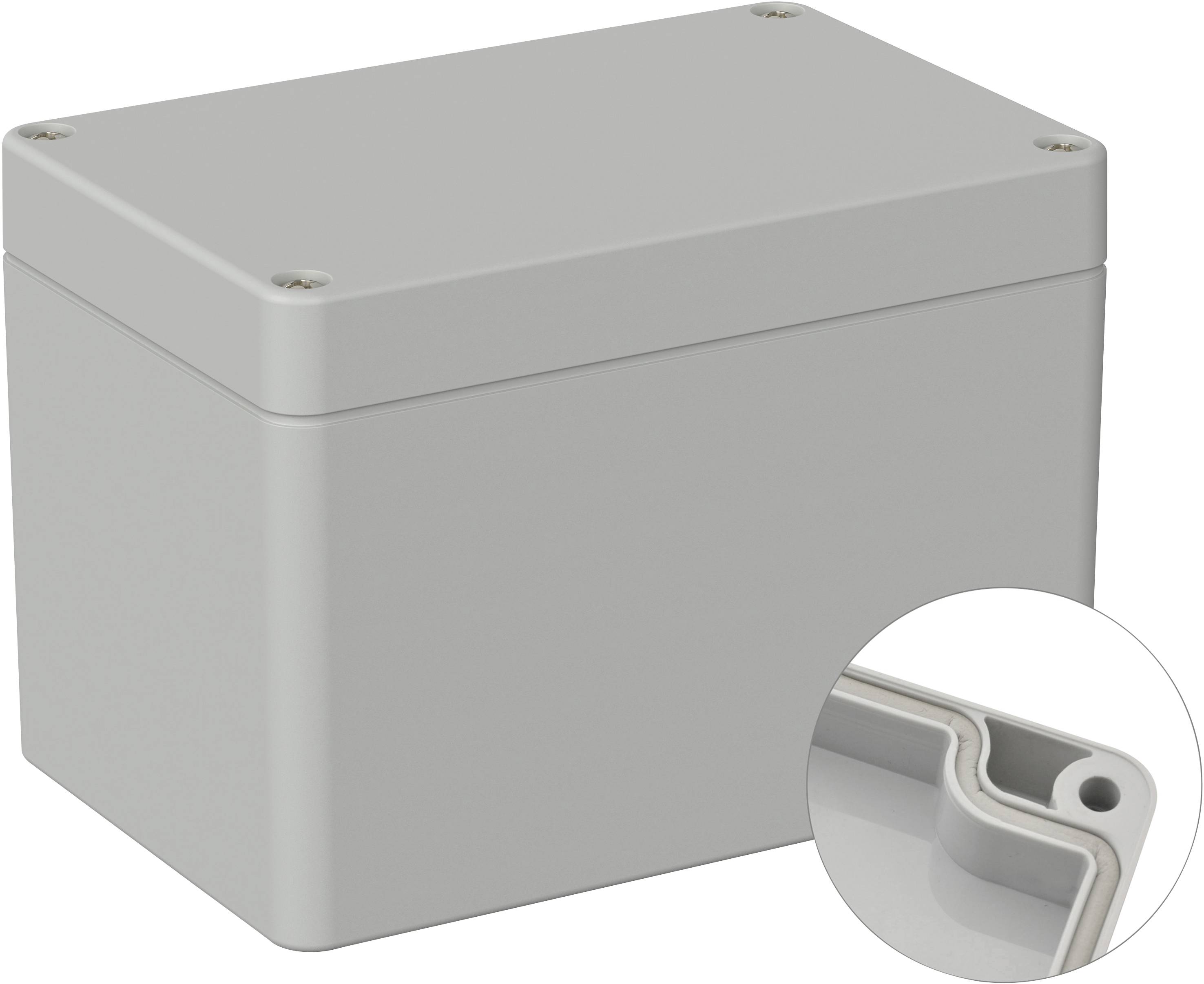 Un boîtier rectangulaire gris avec un couvercle amovible. Un agrandissement montre les détails d'un coin avec un trou de vis.