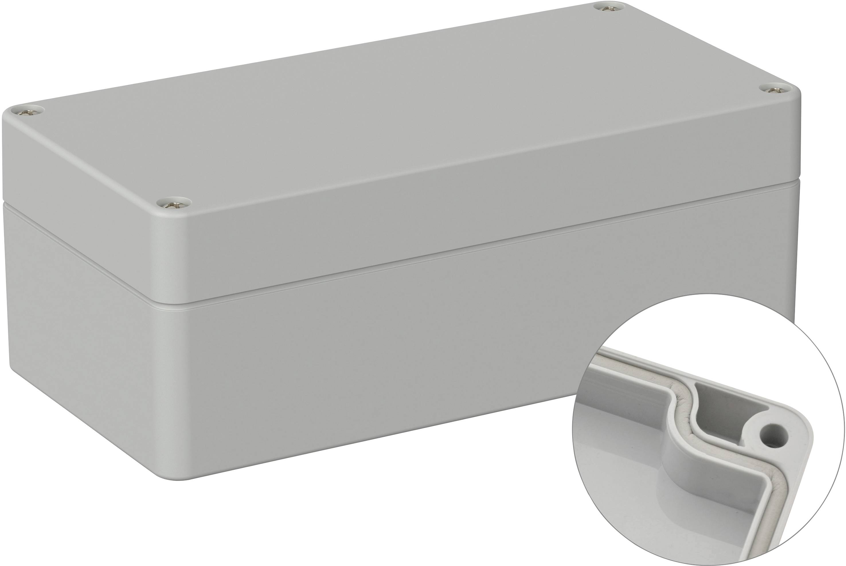 Boîtier rectangulaire gris aux coins arrondis, représenté dans la partie principale. En détail, le cercle montre l'intérieur du boîtier.