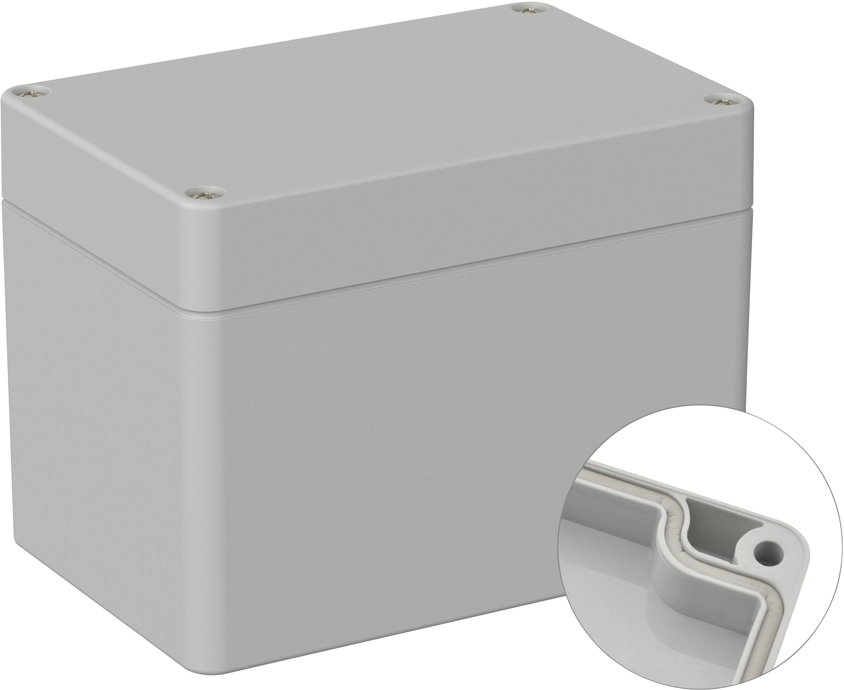 Boîtier rectangulaire gris avec couvercle amovible. Vue détaillée agrandie d'un coin avec un trou de vis en bas à droite.