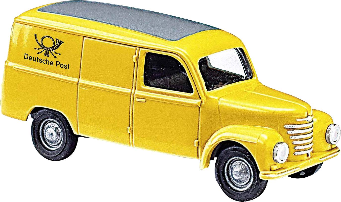 Voiture miniature jaune de la Deutsche Post avec un toit gris, sur le côté se trouve le logo du cor postal et l'inscription 'Deutsche Post'.