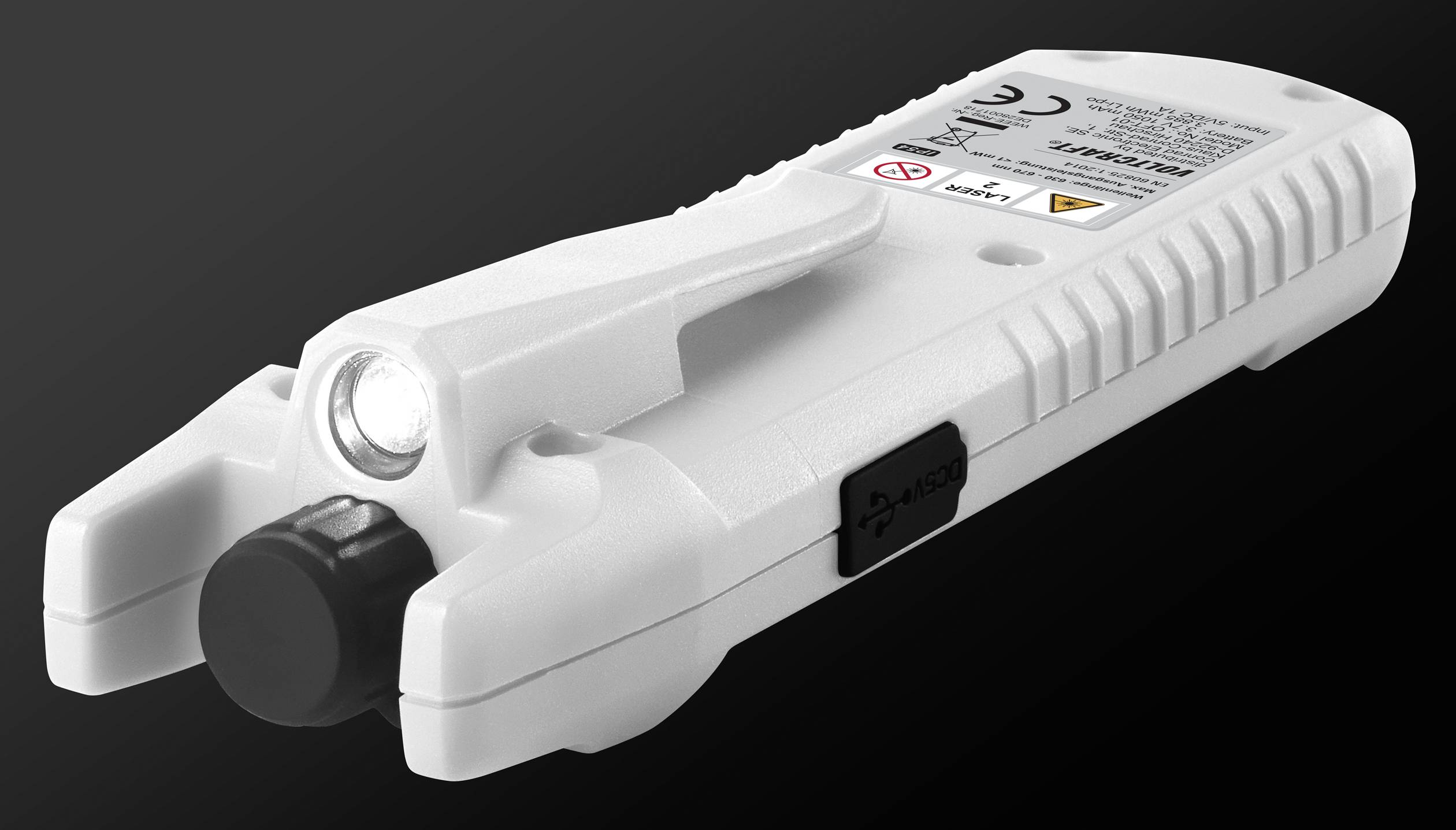 Lampe de poche blanche portable avec des autocollants et un interrupteur marche/arrêt sur le côté. L'appareil est représenté sur un fond sombre.