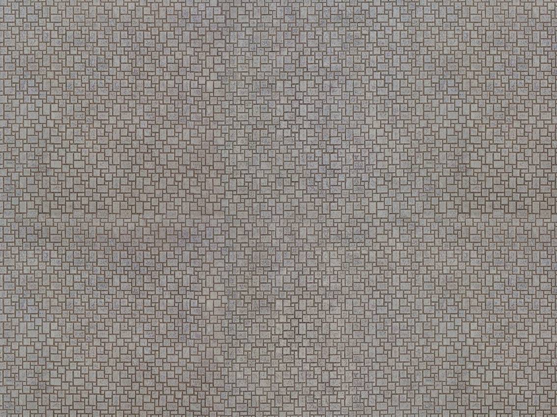 De petites tesselles carrées de mosaïque dans différentes nuances de gris forment un motif répétitif et symétrique.