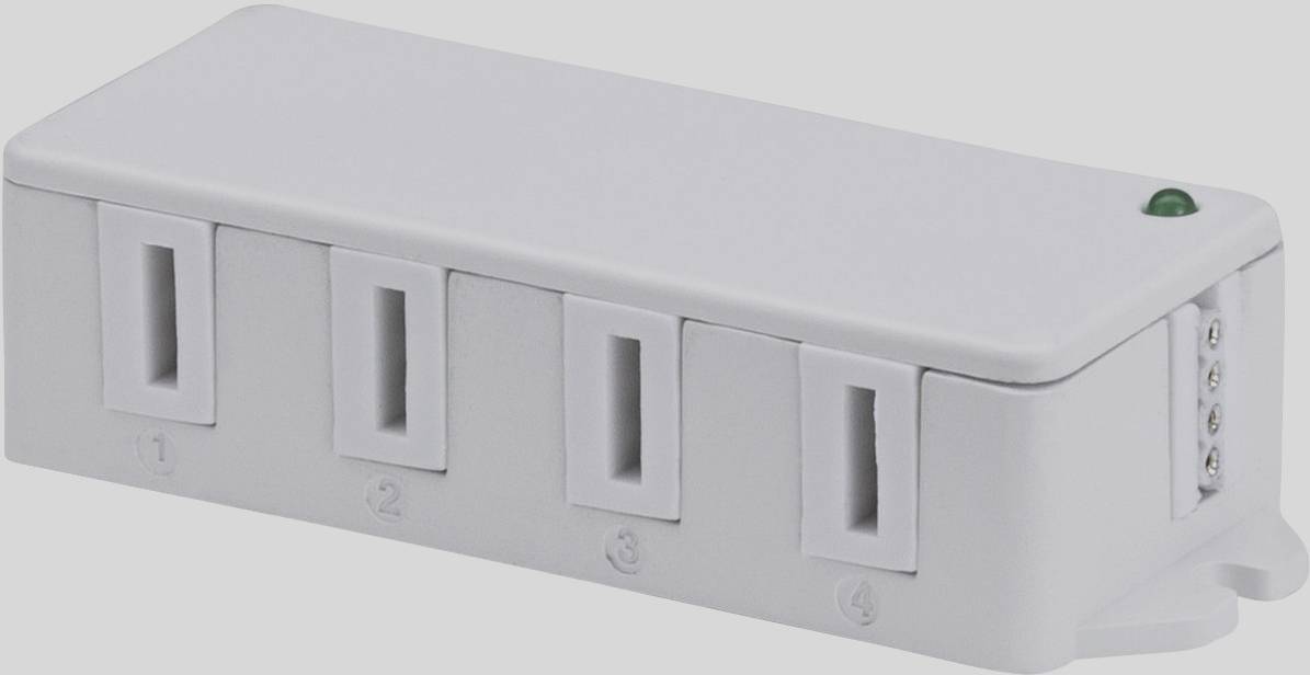 Un appareil électrique blanc avec quatre emplacements numérotés et une lumière verte en haut.