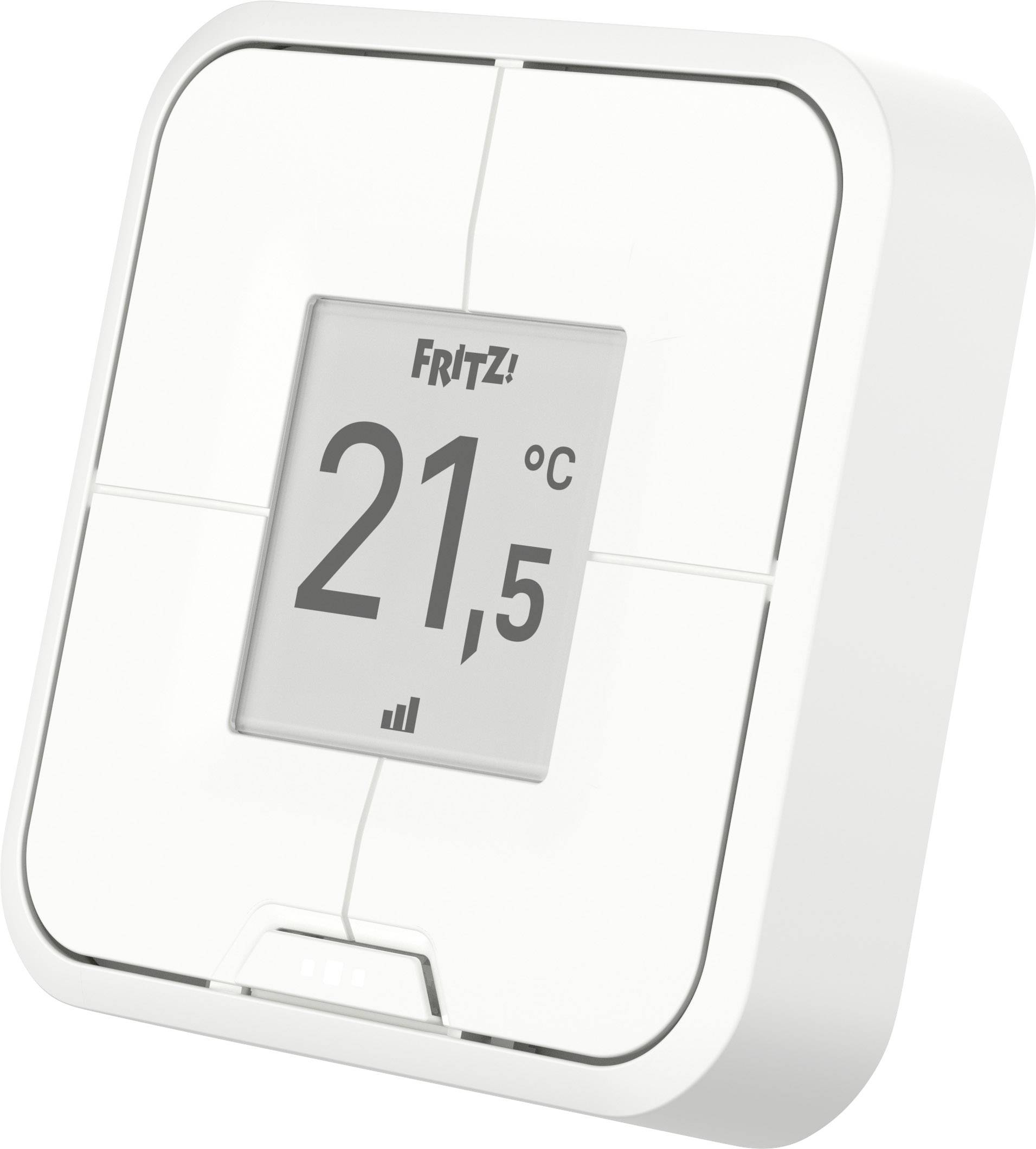 Un thermostat mural blanc avec affichage numérique indique '21,5°C'.