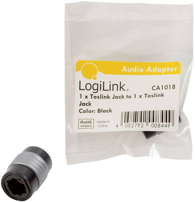 Un adaptateur Toslink de la marque LogiLink. L'emballage indique les spécifications : 1x prise Toslink vers 1x prise Toslink, couleur : Noir. L'emballage est conforme à la norme RoHS.