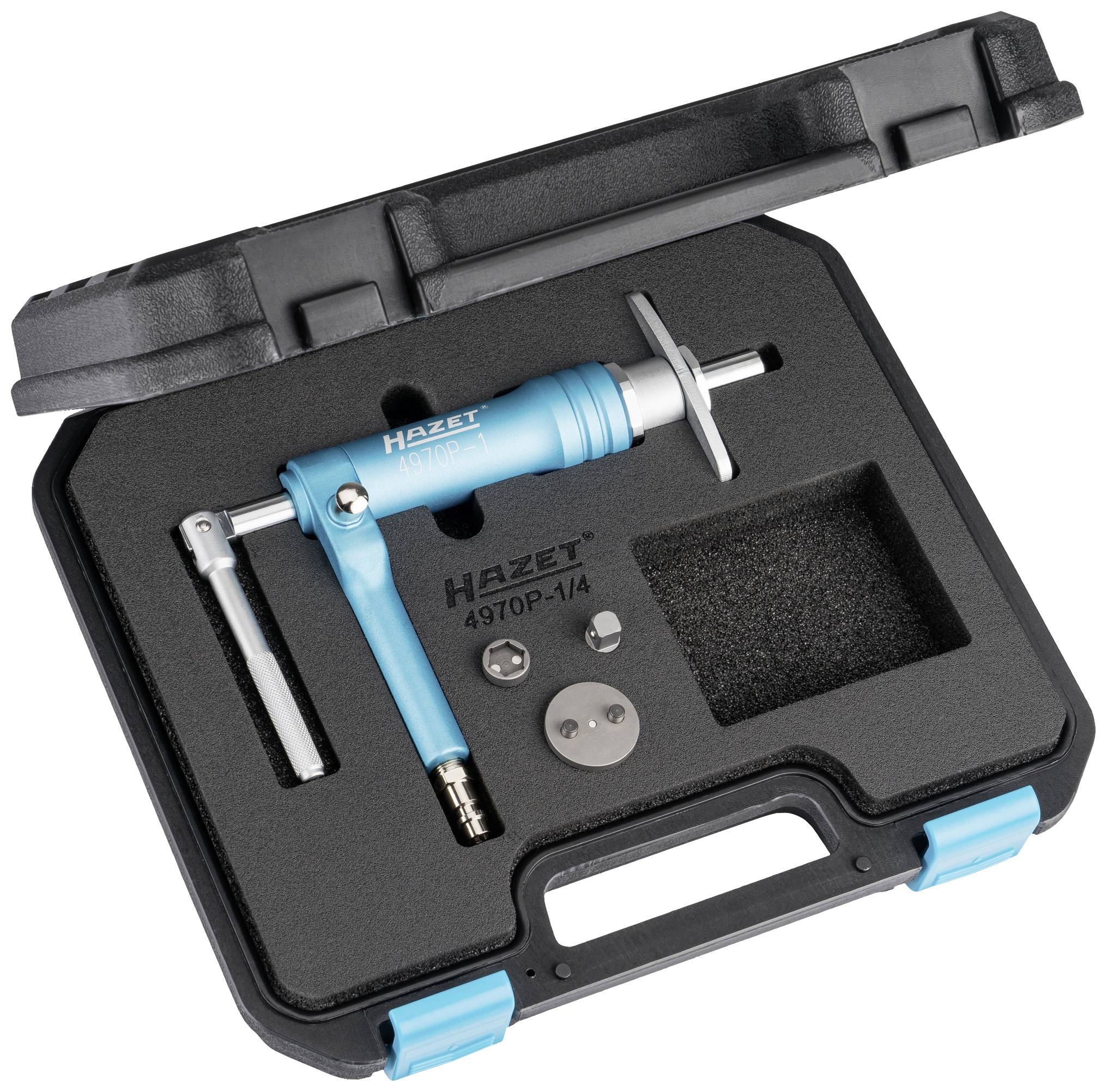 Ensemble d'outils dans un coffret noir. Comprend une clé dynamométrique bleue Hazet, modèle 4970P. Des insertions en mousse protègent les pièces.