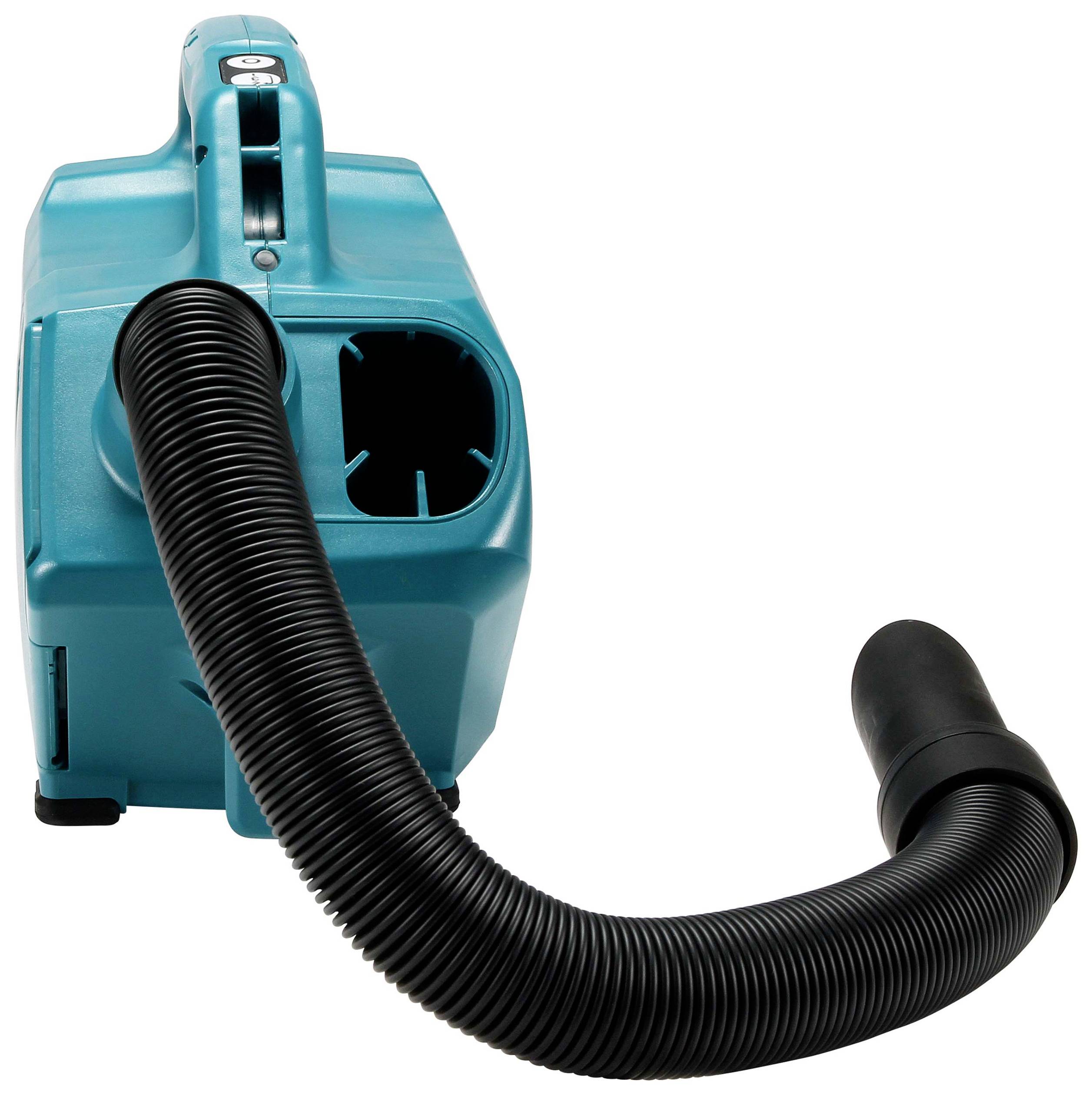 Un aspirateur portable bleu-vert avec un long tuyau flexible, utilisé à des fins de nettoyage.