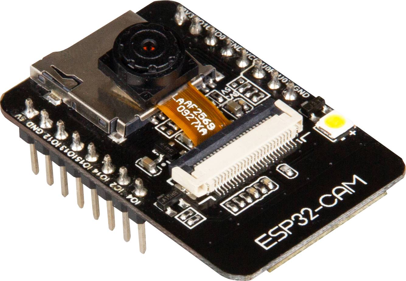Module ESP32-CAM avec caméra. Contient des emplacements pour broches de connexion et un objectif pour la capture d'images. Texte 'ESP32-CAM' imprimé.